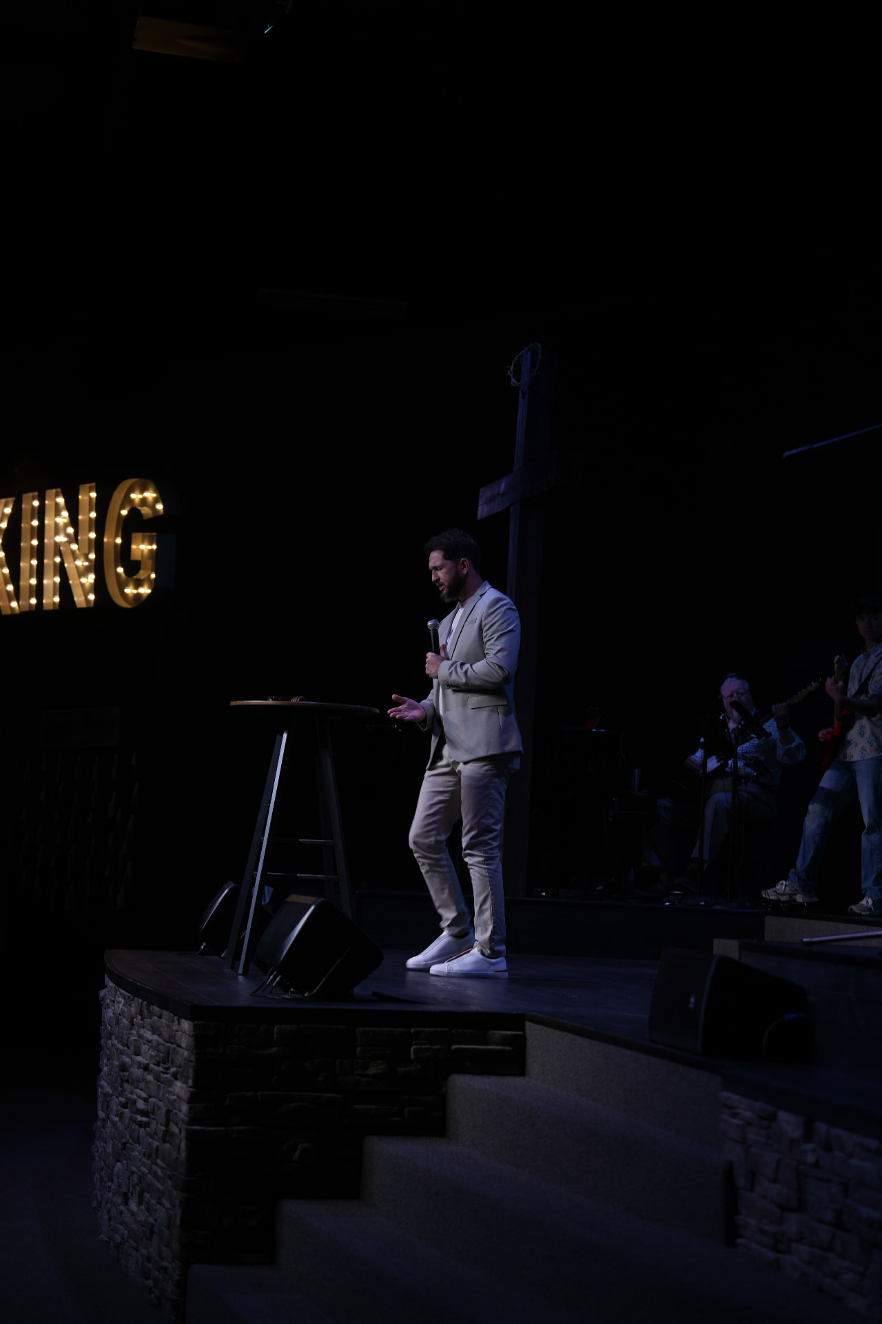 Cody preaching to an adult congregation